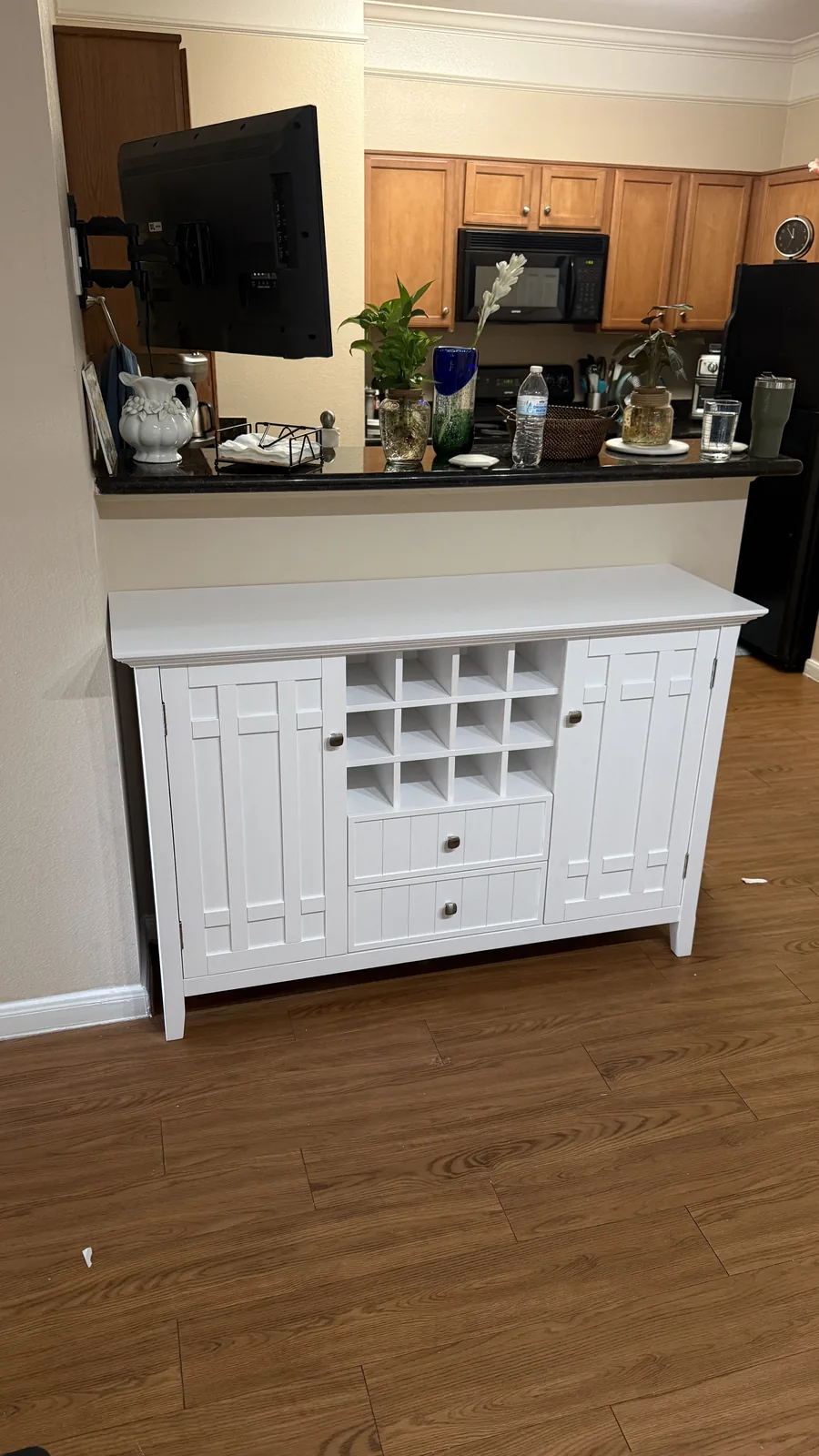 Buffet cabinet with wine rack assembled in a Houston-area kitchen