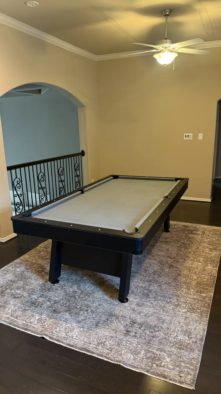 Pool table assembled in a Houston-area game room